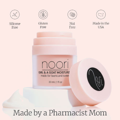 Noori moisturizer jar with a pink lid on a light background