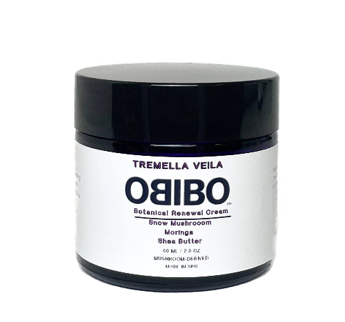 OBIBO cream jar with black lid on a white background