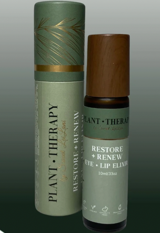 Plant Therapy skincare product with green and brown packaging on a gray background
