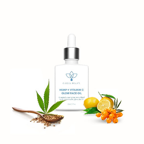 A bottle of Hemp + Vitamin C Glow Face Oil by Olecea with a dropper, labeled for skincare use.