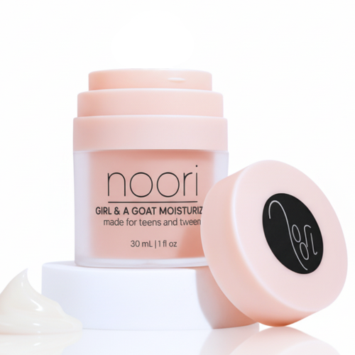 Noori moisturizer jar with pink lid on a white background