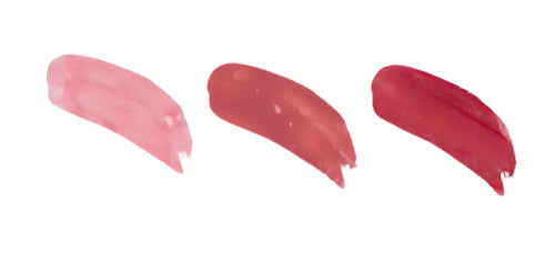 Three swatches of pink lipsticks on a white background