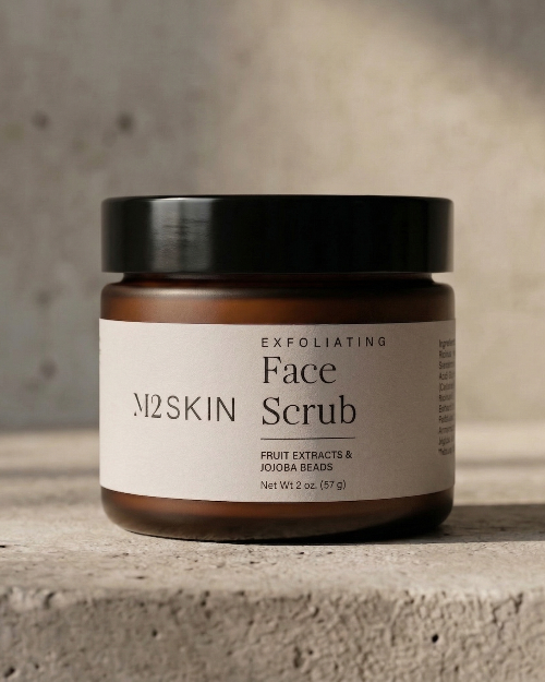 Jar of M2SKIN Exfoliating Face Scrub on a concrete surface with a neutral background