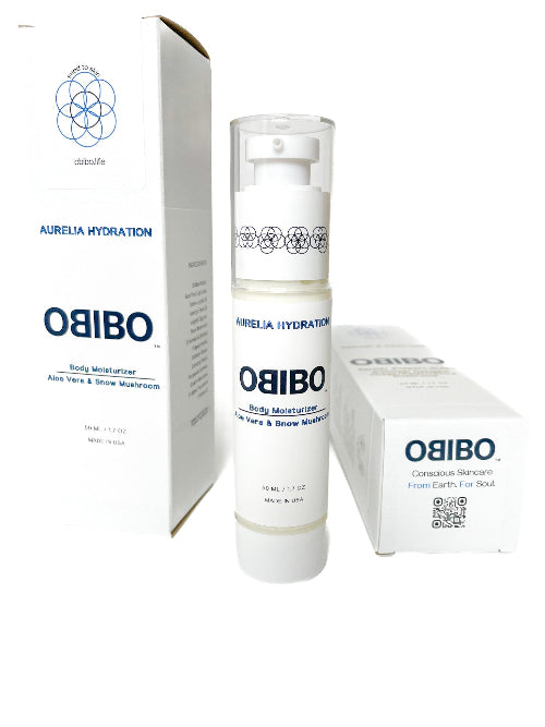 A bottle of OBIGO Aurelia Hydration Body Moisturizer stands in front of its white retail box, with a second box at right, on a plain white background.