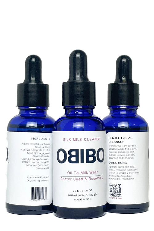 Three blue bottles with black droppers labeled 'OBIBO' on a white background.