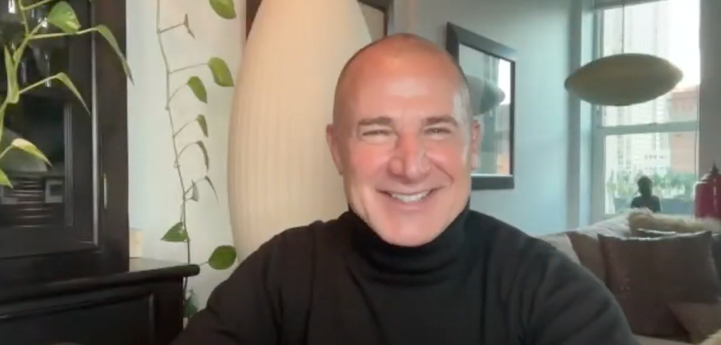 Nick smiling in a home setting