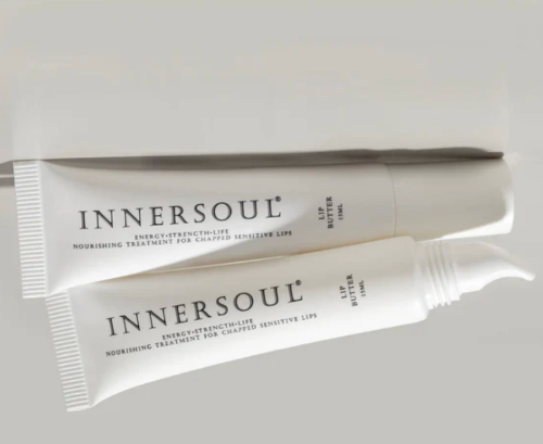 Two white tubes of Innersoul lip balm, one with a flip-top cap and one with a pipette tip, shown on a light gray background.