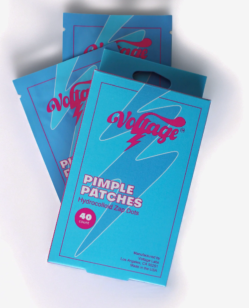 Three blue Voltage brand pouches of Pimple Patches Hydrocolloid Cap Dots are stacked on a white background.