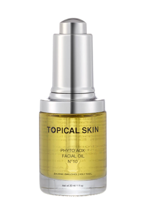 Topical Skin facial oil bottle on a white background