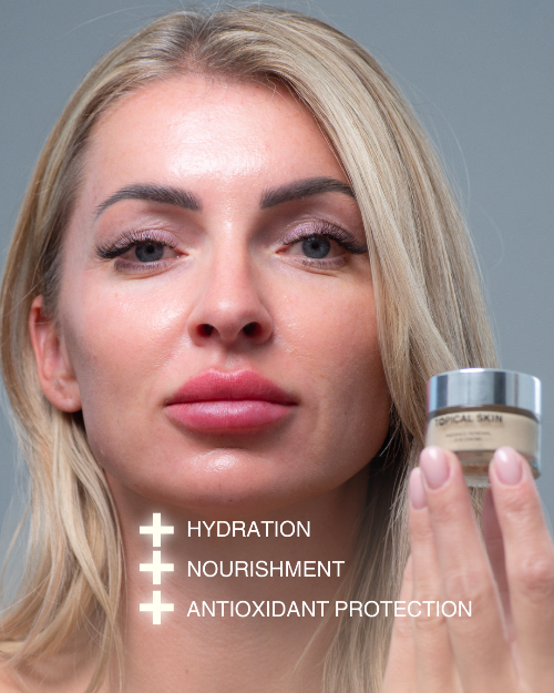 Woman holding a jar of skincare product with text on hydration, nourishment, and antioxidant protection.