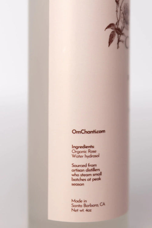 Product bottle with 'OmChantico' branding and ingredient details on a light background